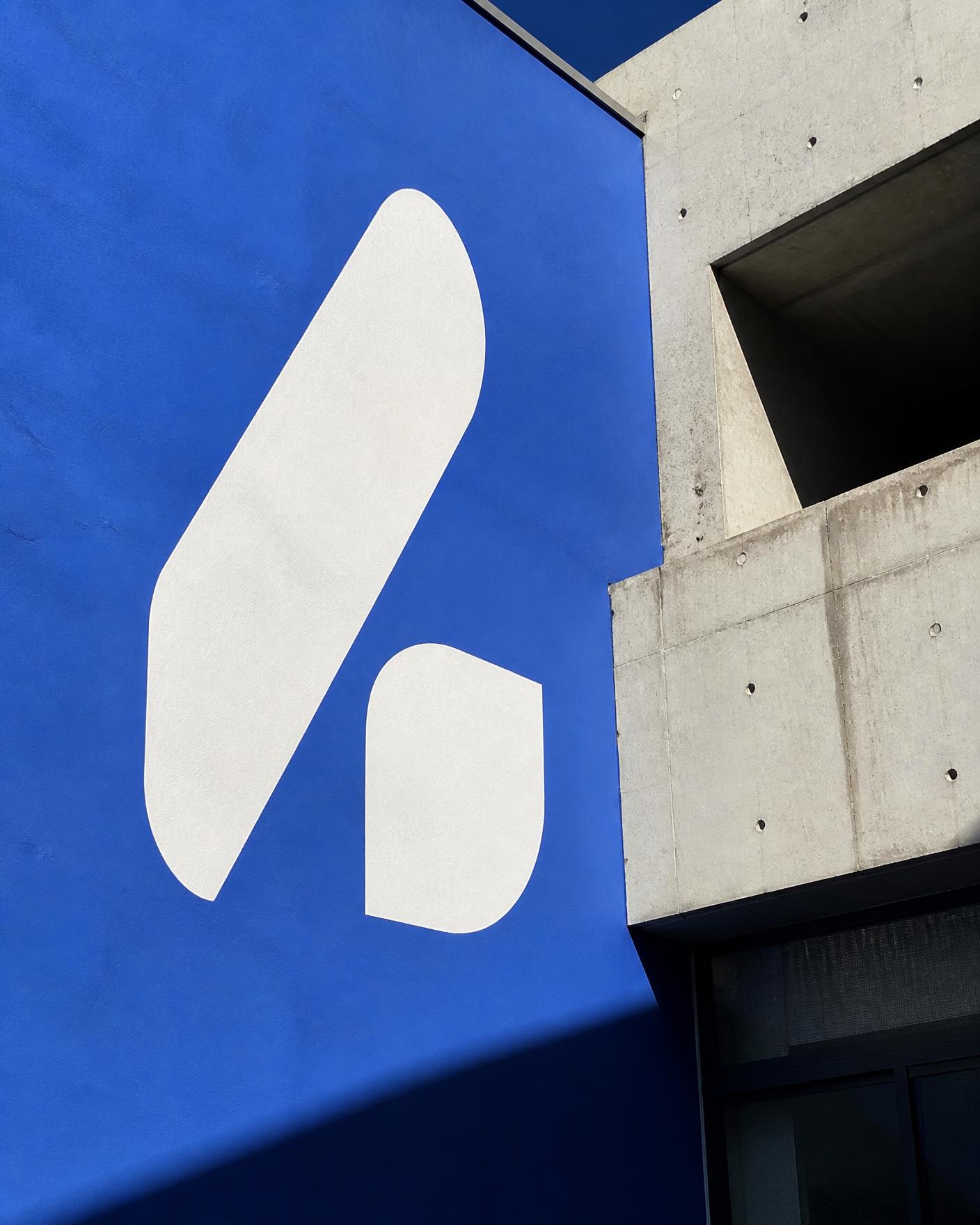 Signage on cobalt wall
